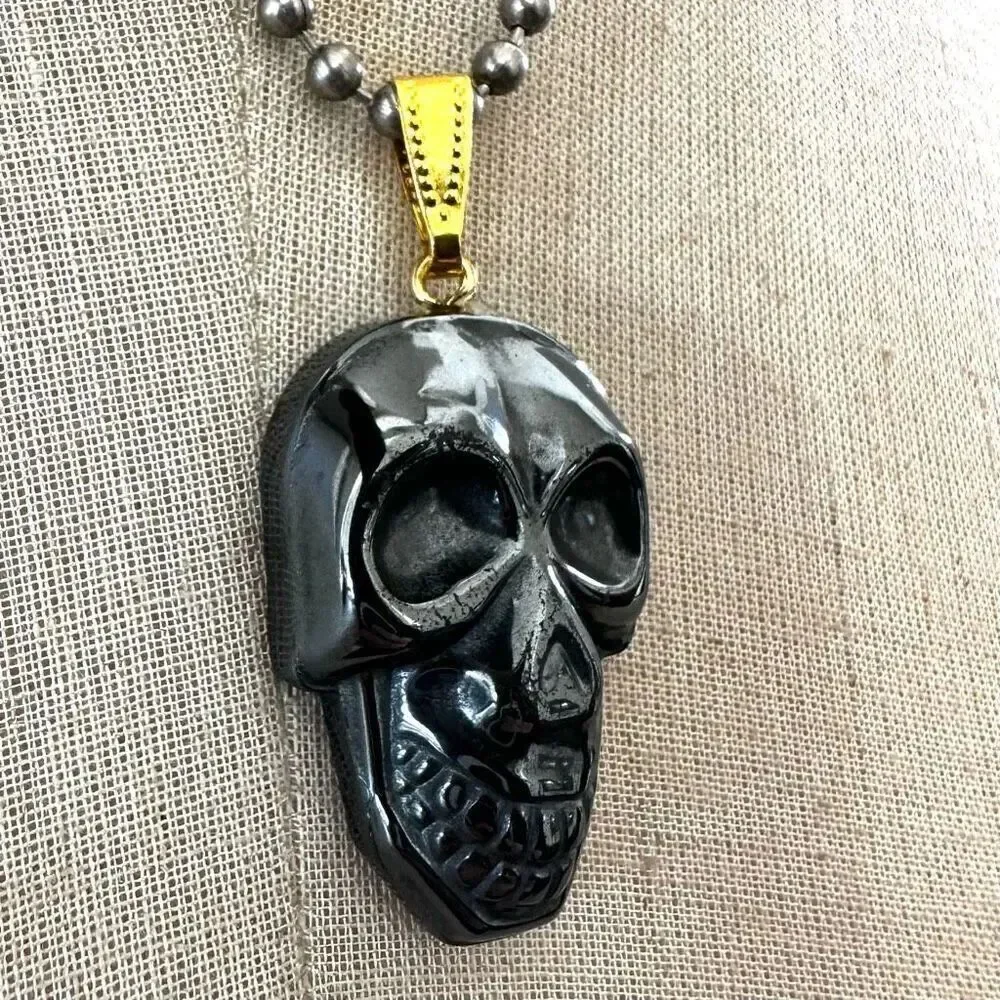 Hematite skull pendant necklace